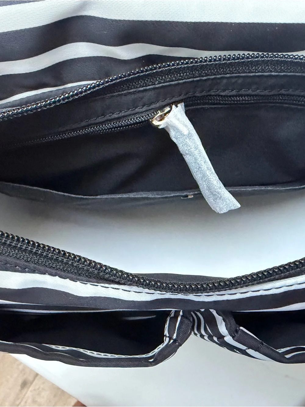 kate spade Black and White Striped Crossbody Bag with Gold Logo